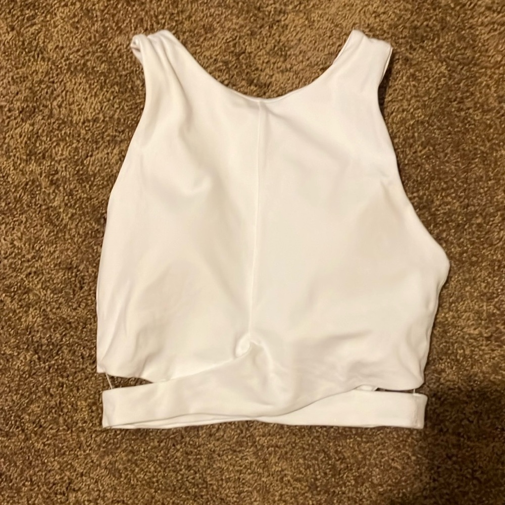 ATHLETA. WHITE SPORTS BRA WITH RACER BACK. BRAND NEW. SIZE XS. NWOT